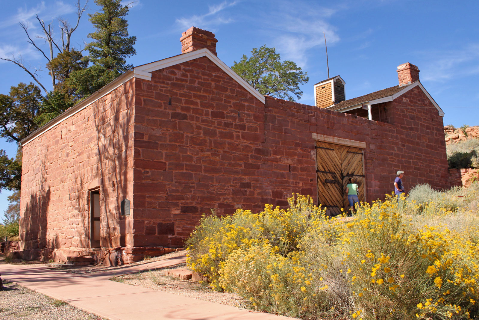 A large sandstone building with large doors at Pipe Springs National Monument near Kanab, Utah